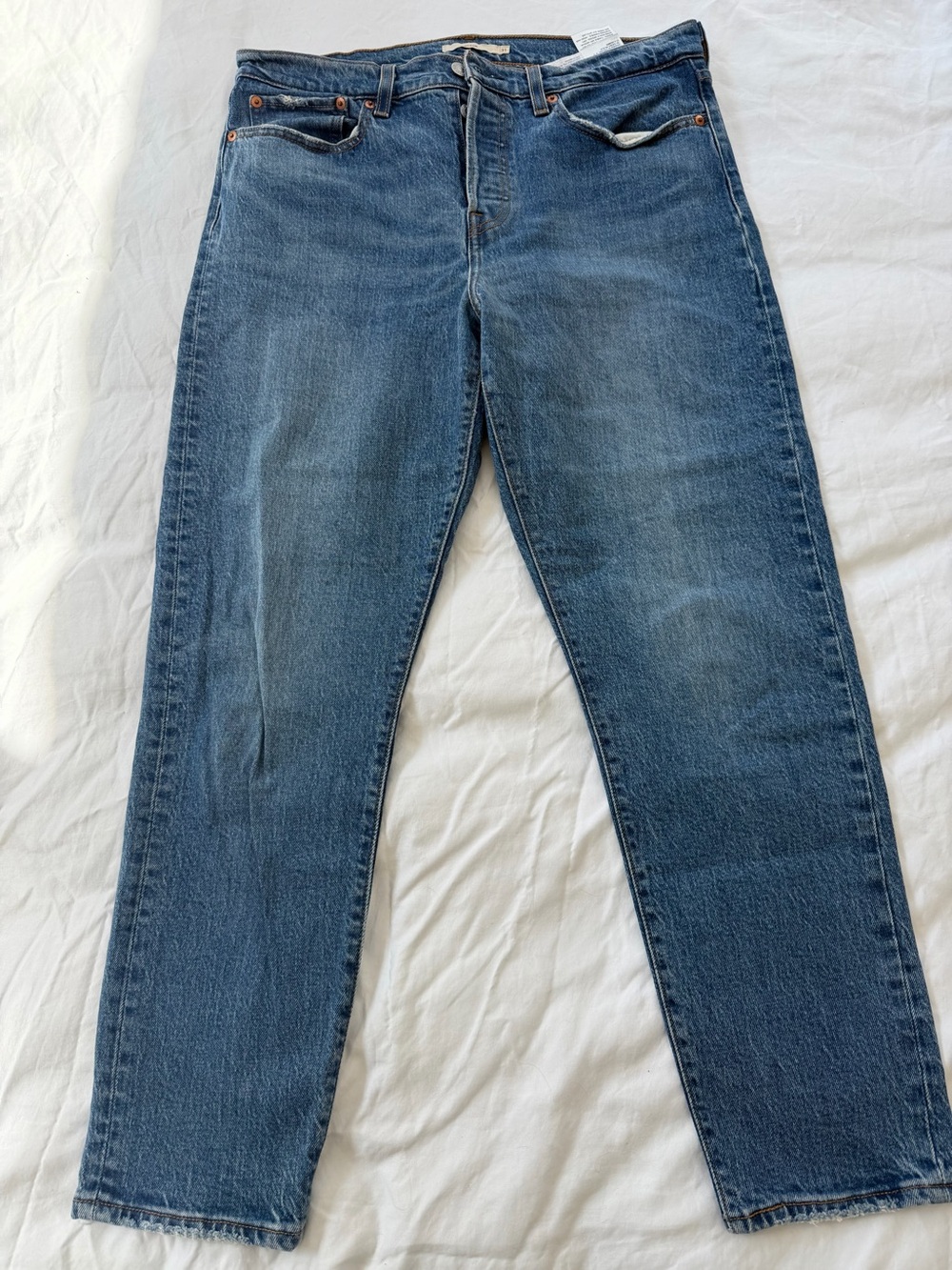 Vintage Levi's Women's Straight Jeans in Medium Blue